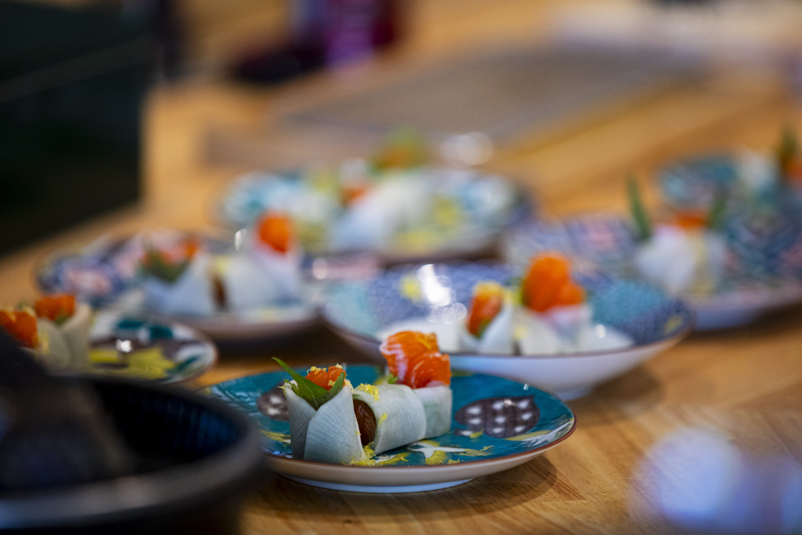 Premium sashimi and seafood prepared for private events at Sushi Adachi